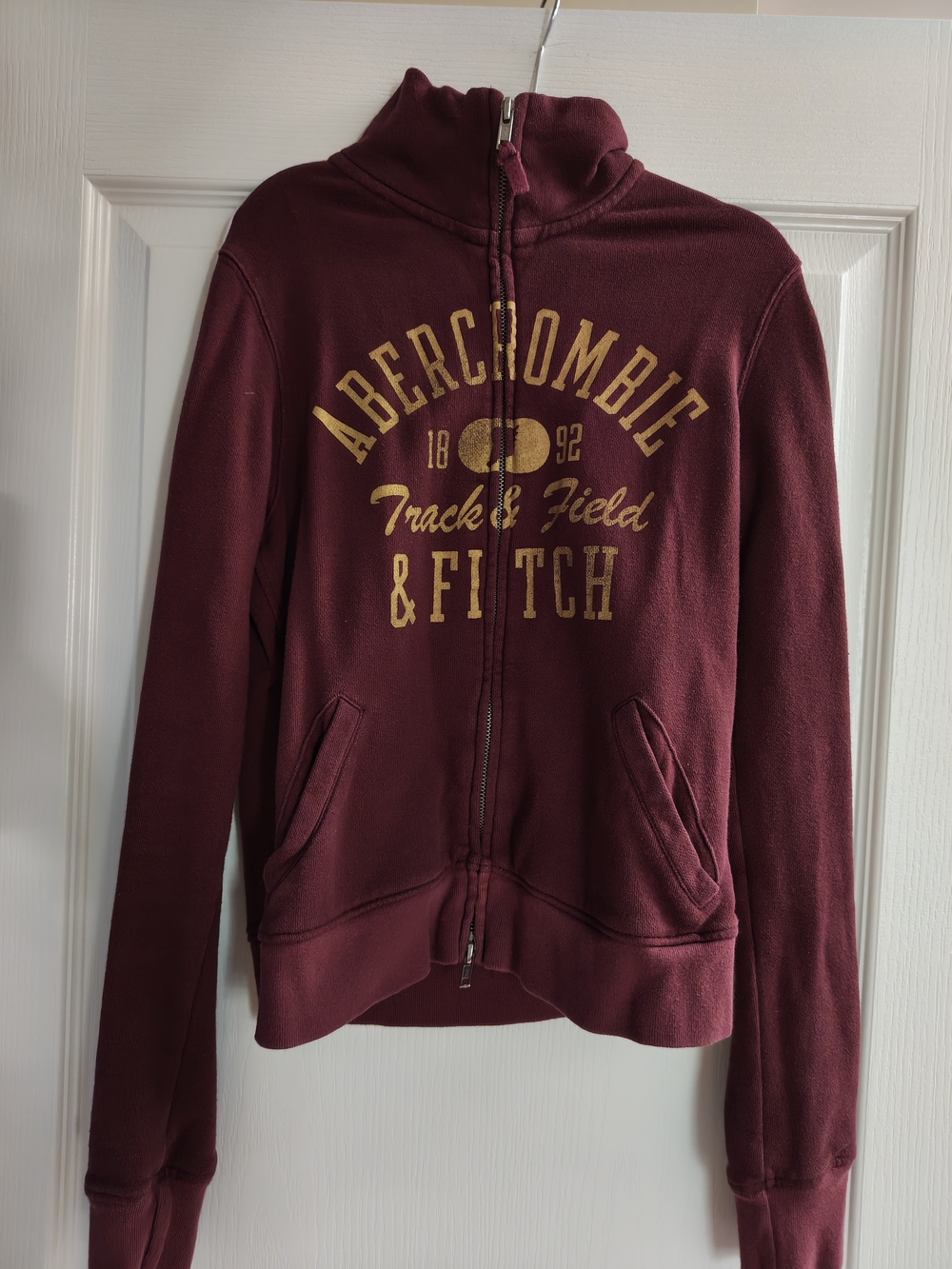 1990VintageAbercrombie & Fitch Maroon Zip-Up Track & Field Hoodie with Gold Logo